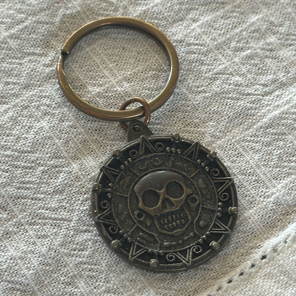Disney Pirates of the Caribbean Metal Coin Keychain